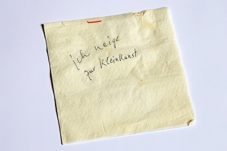 Serviette mit Aufschrift "Ich neige zur Kleinkunst".