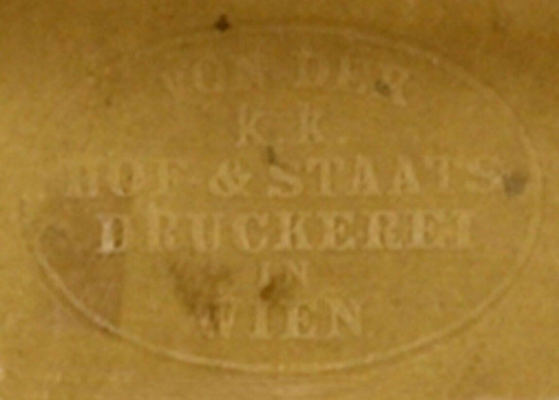 Prägestempel auf vergilbtem Papier von der K&K Hof & Staatsdruckerei.
