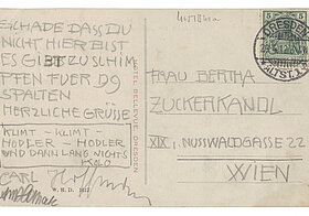 Rückseite einer beschriebenen Postkarte