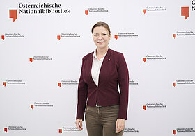 Ein Mensch posiert für ein Foto.