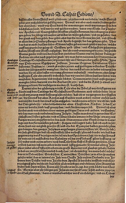 Dicht beschriebene, alte Buchseite.