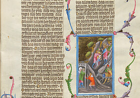 Mittelalterliche Handschrift mit floralen Verzierungen.