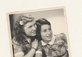 Two black and white photos of two little girls