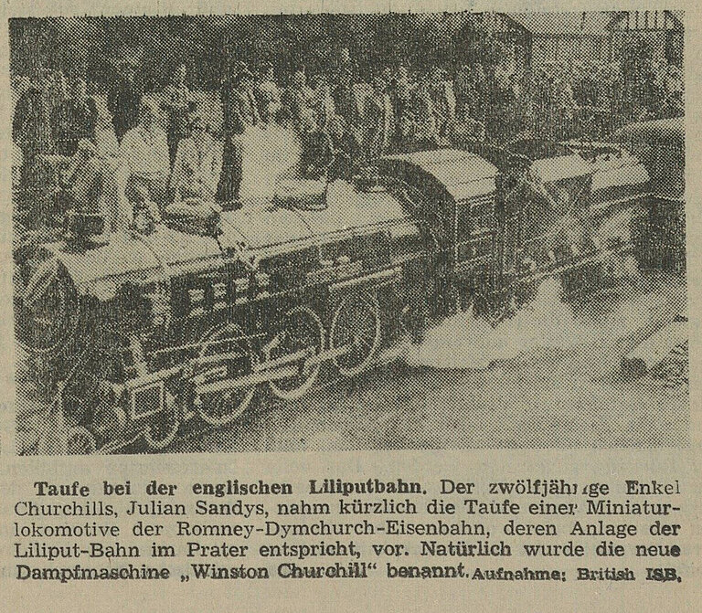 Zeitungsausschnitt, der eine Miniaturlokomotive, zeigt. 