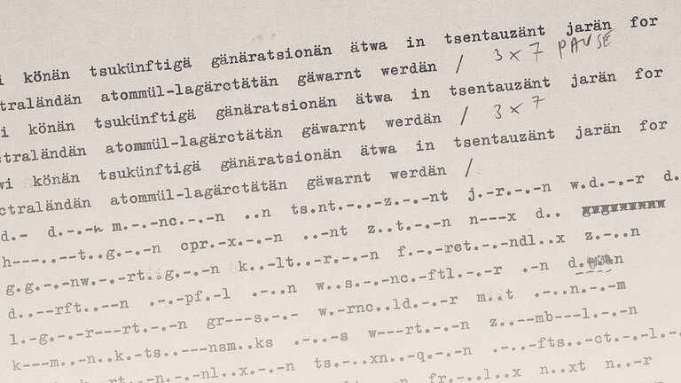 Handschriftlicher Text auf weißem Papier.
